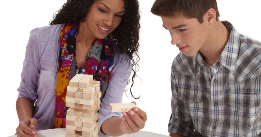 two people playing jenga