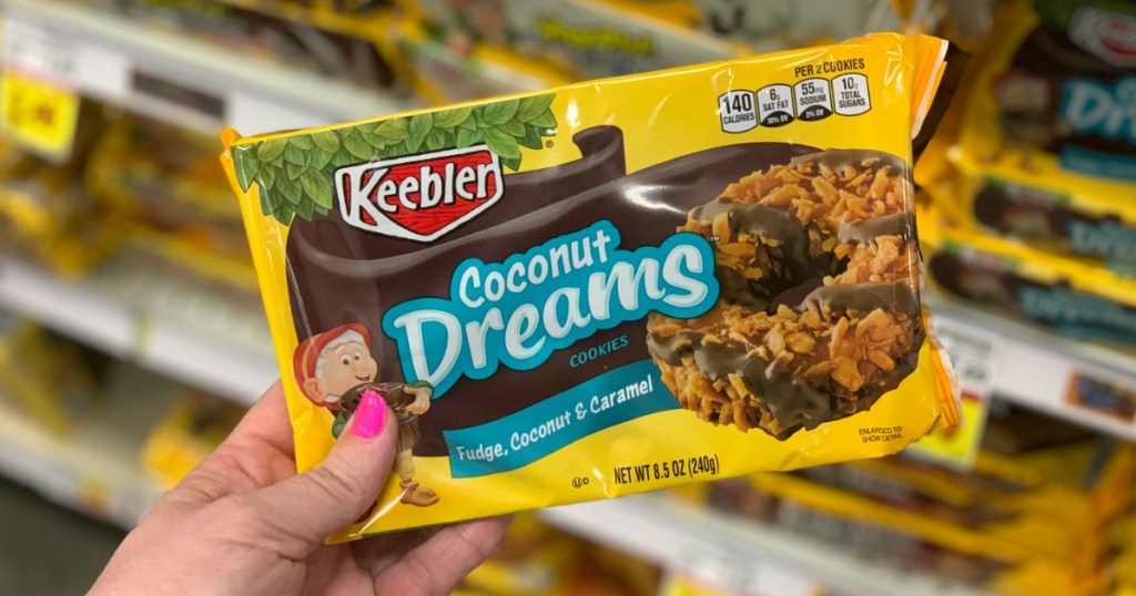 Woman holding box of Keebler Coconut Dreams Cookies