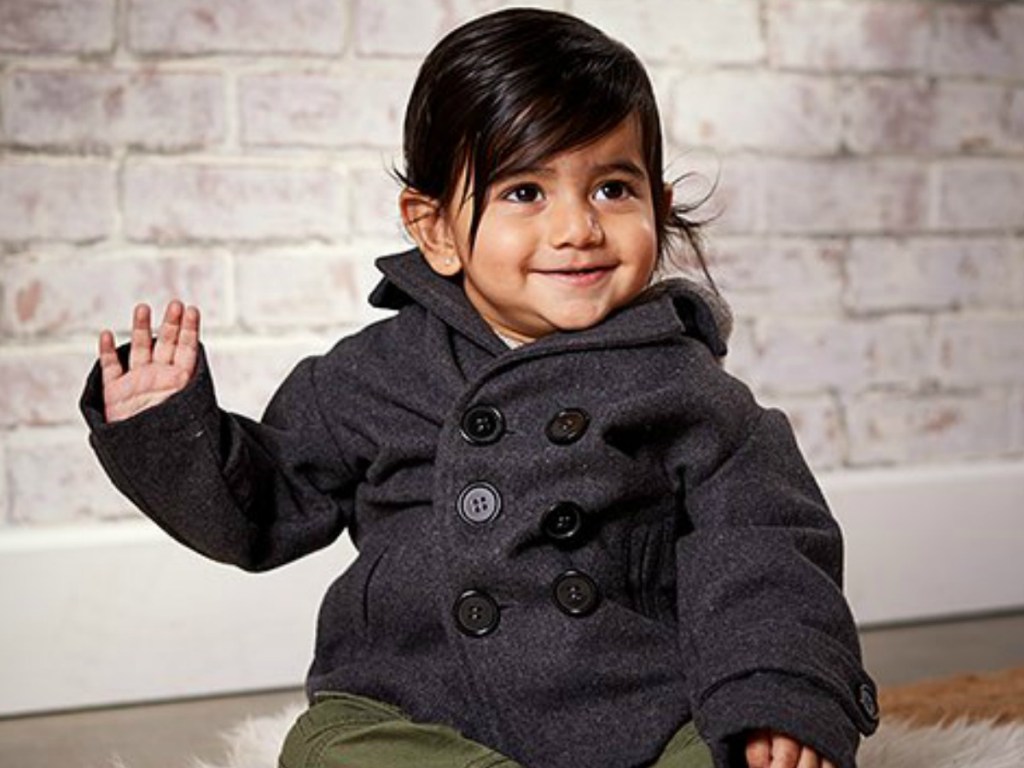 Toddler wearing a black peacoat from Zulily