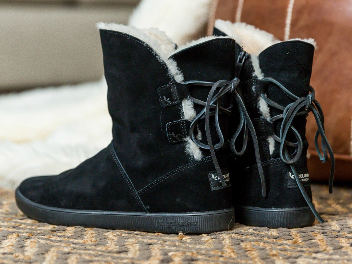 Koolaburra by UGG Shazi boots in black on carpeted floor