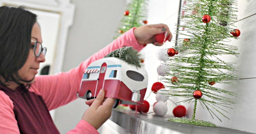 Lina decorating her mantel