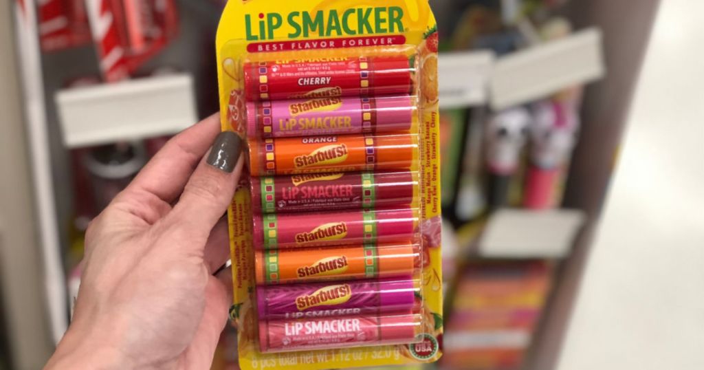 hand holding up lip smackers starburst set