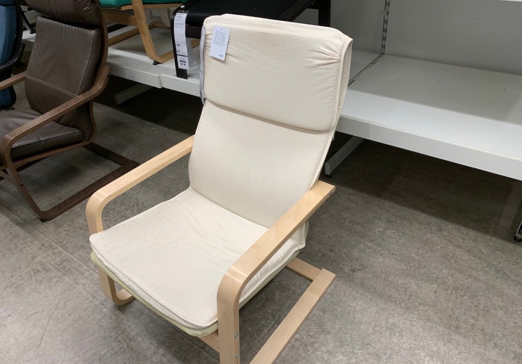 PELLO IKEA armchair sitting on concrete floor in store