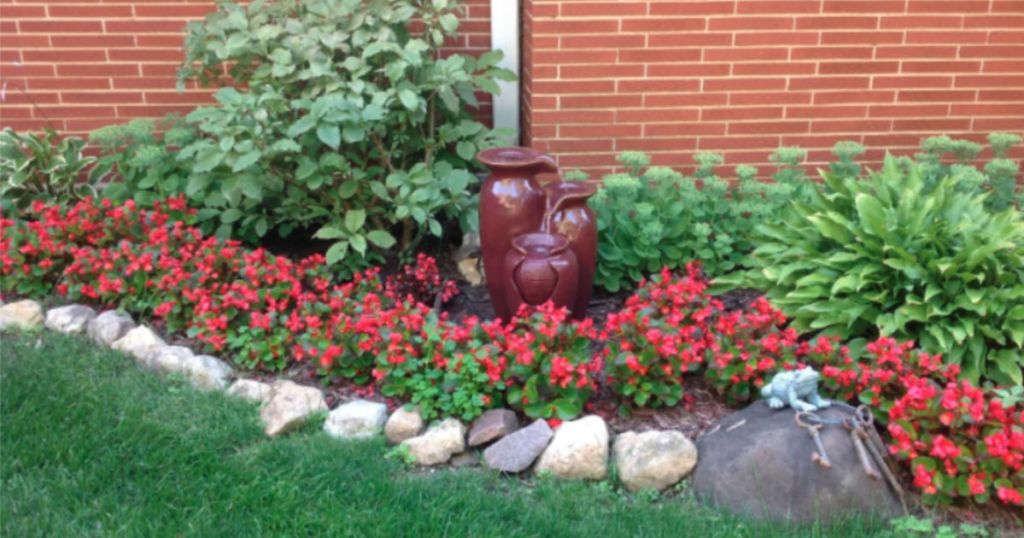 potted fountain in garden area 