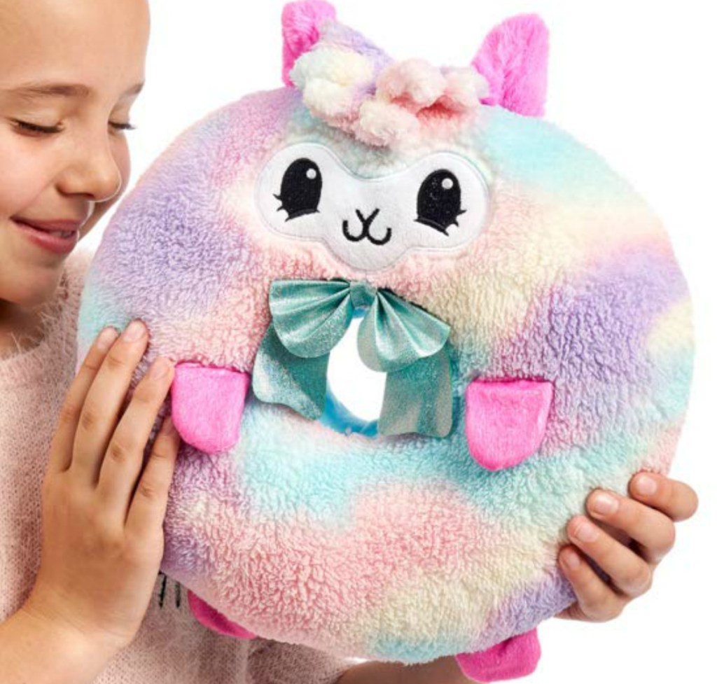 Girl holding llama Pikmi Pops