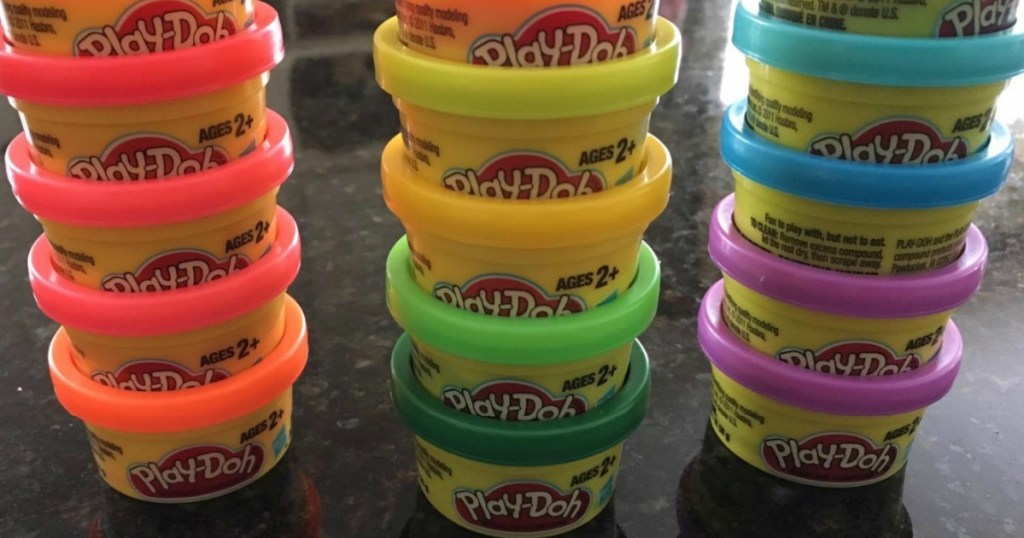 Small containers of Play-Doh on counter