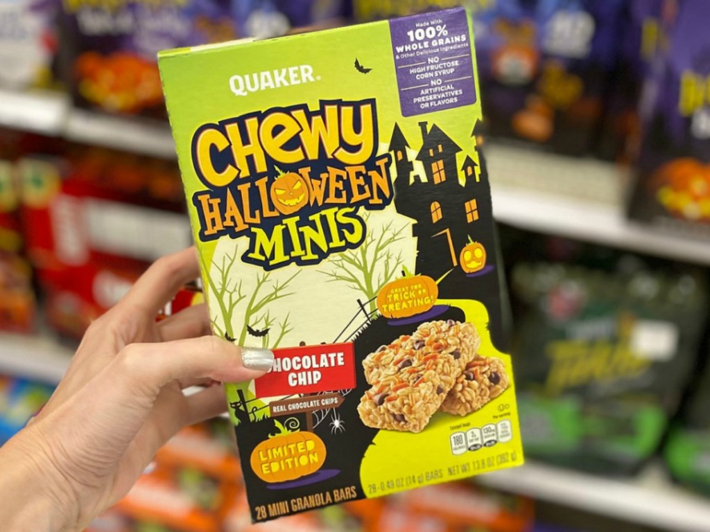 box of Halloween-themed Quaker chewy bars in hand in-store