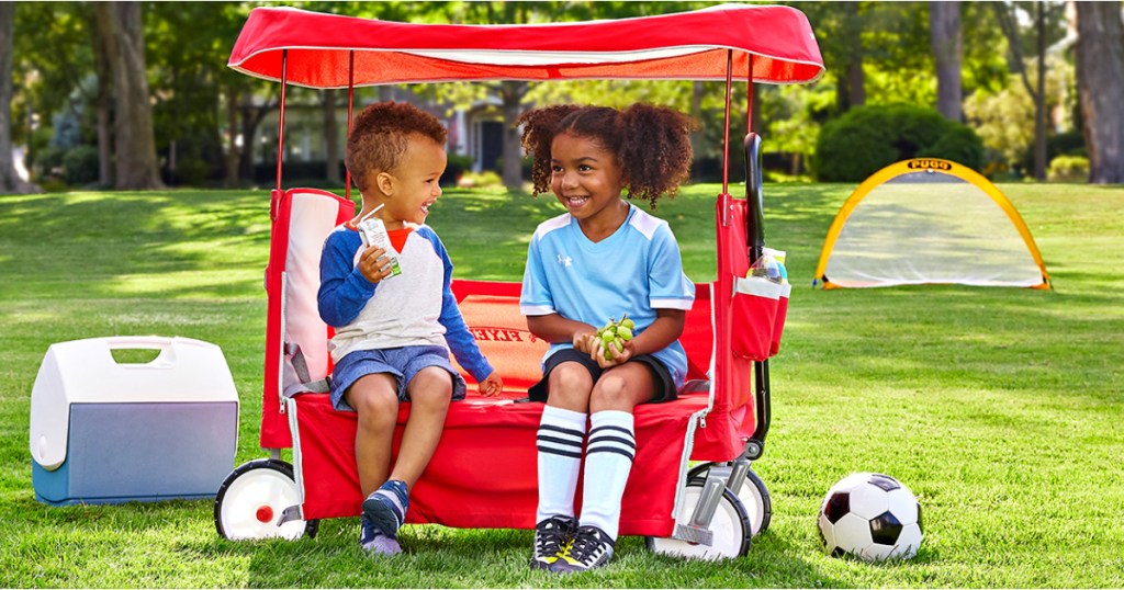 kids playing in radio flyer wagon