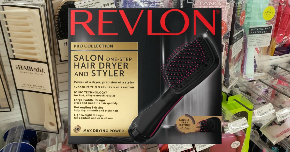 Revlon One-Step Paddle Dryer in box in front of in-store brush display