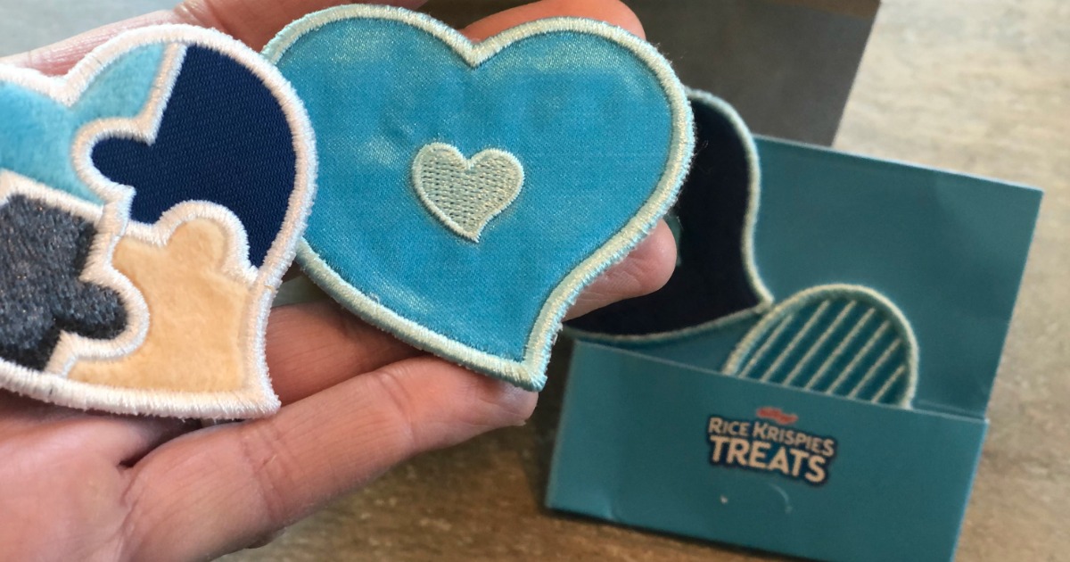 Woman holding Sensory Love Note Stickers from Rice Krispies Treats