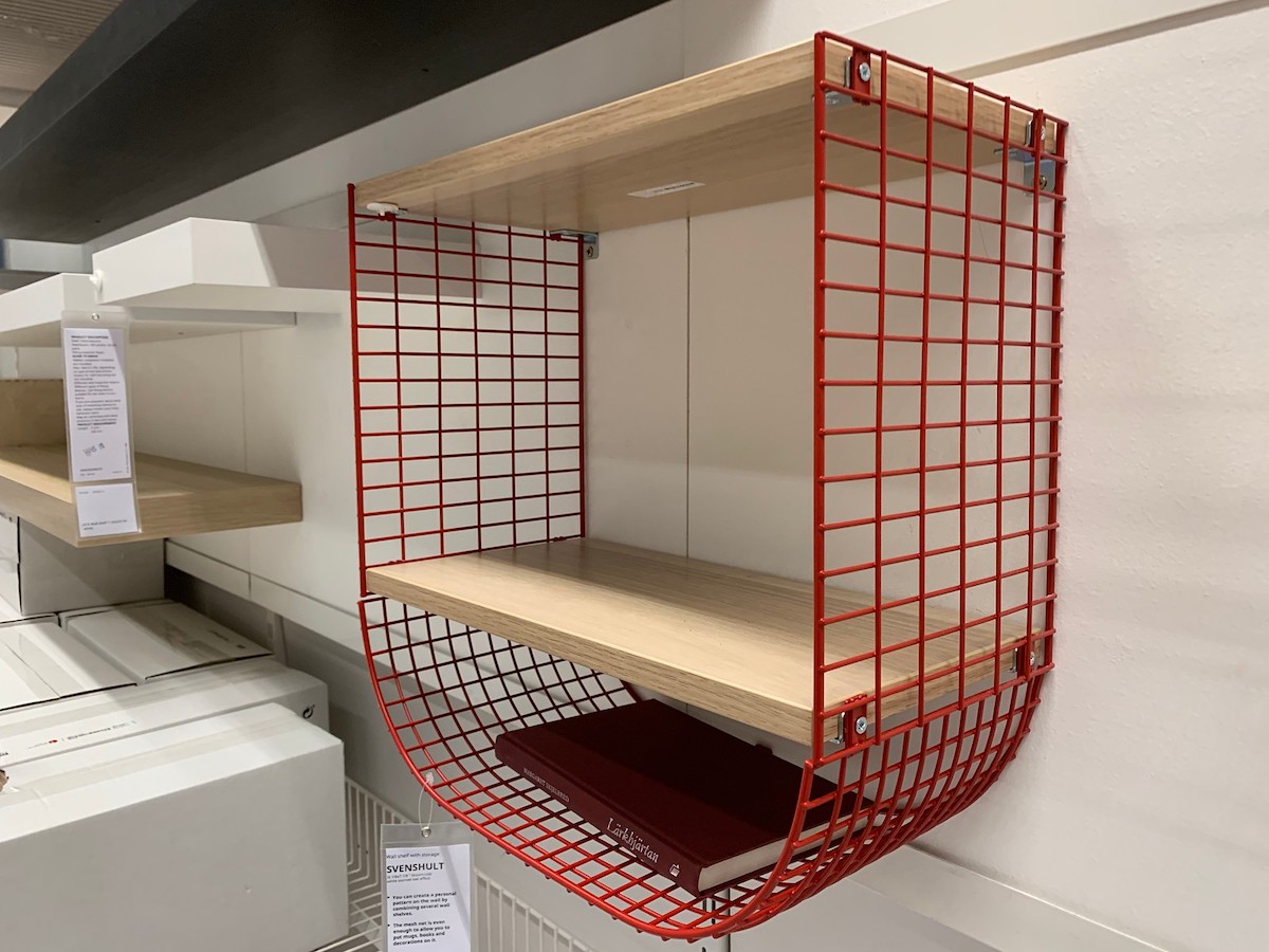 red wire basket shelf on wall