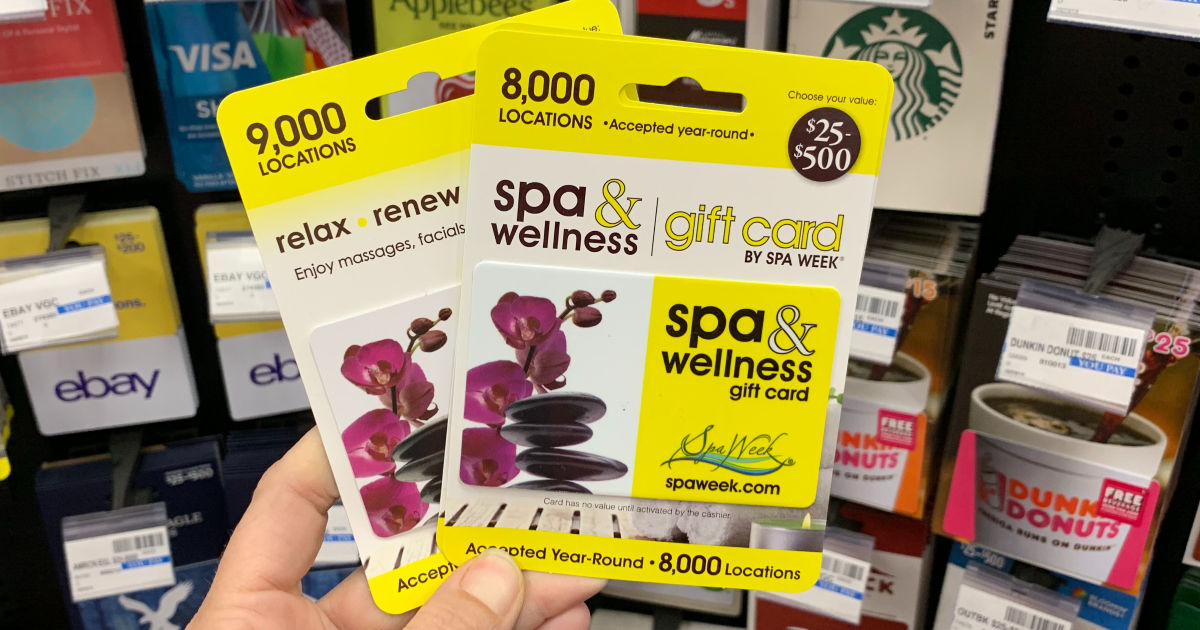 Hand holding Spa & Wellness gift cards