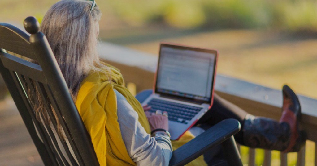 Woman surfing the internet on laptop