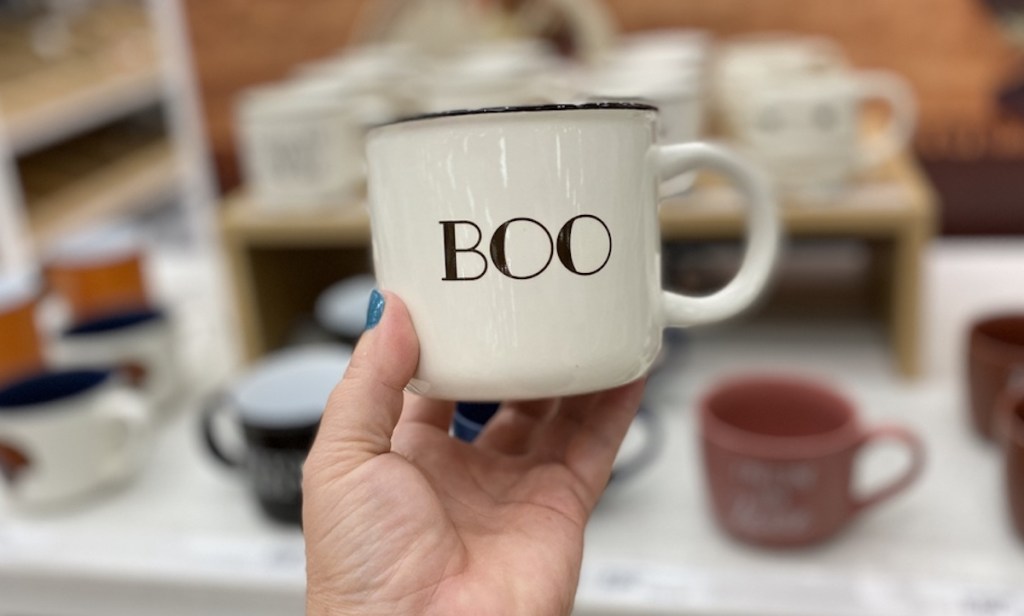 hand holding Threshold Boo Mug