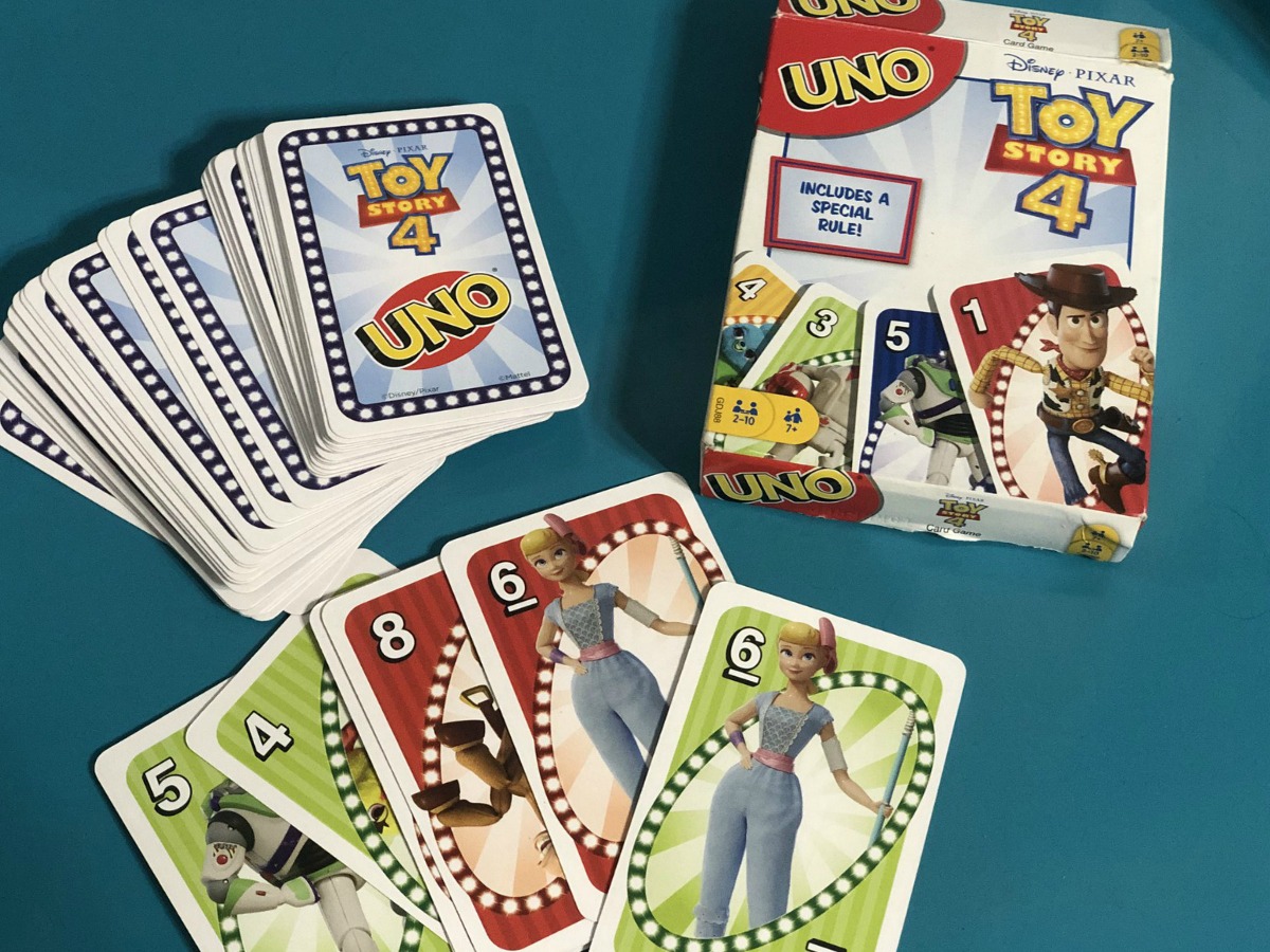 Toy Story 4 Card Game with a teal backround