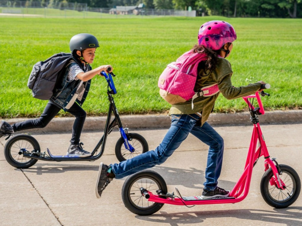 two kids on a Mongoose Scooter