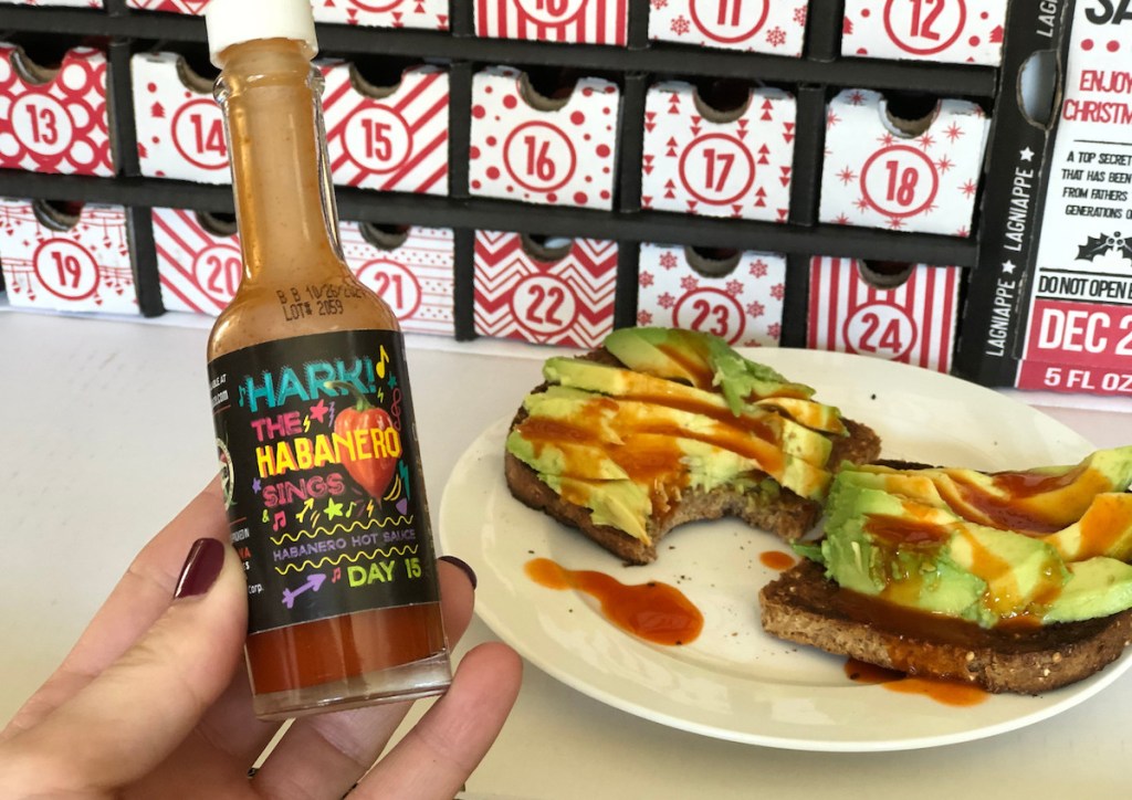 hot sauce on avocado toast with advent calendar