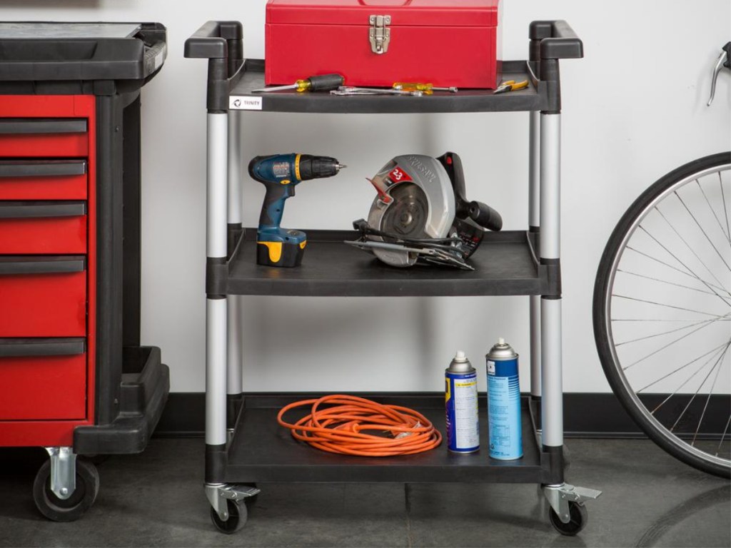 storage rack in garage holding tools