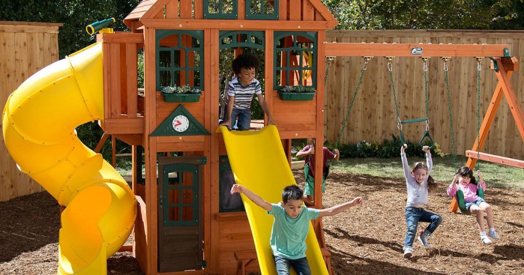 kids playing on kidkraft orchard view manor playset