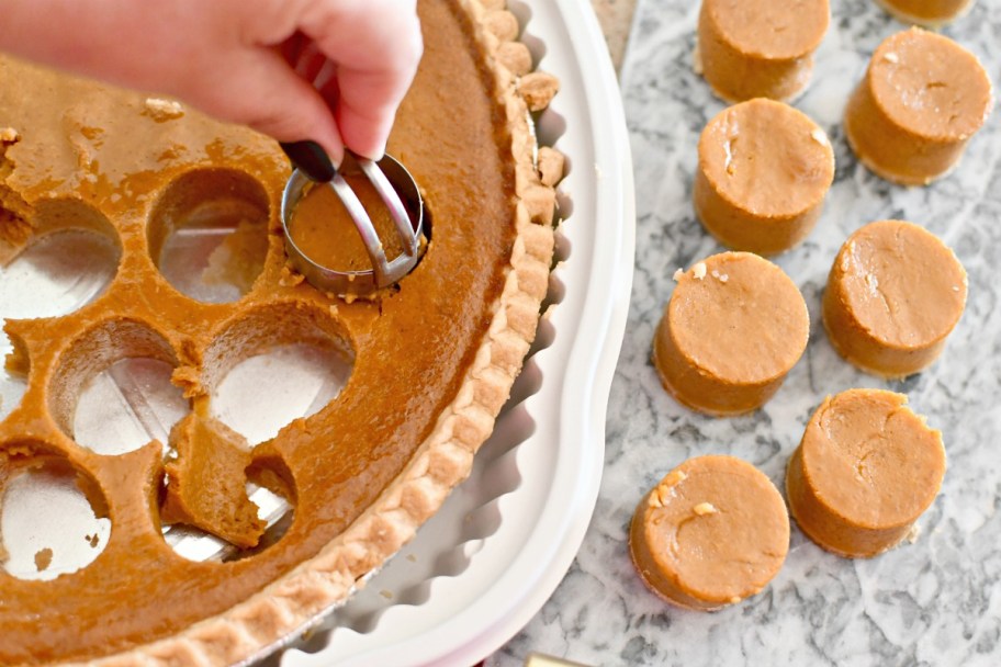 making pumpkin pie bites using a biscuit cutter