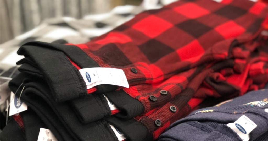 red and black flannel pajama pants laid out in store