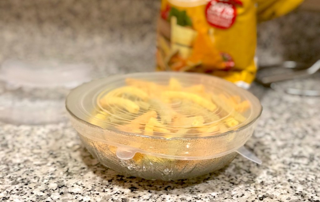 veggies straws in clear bowl with silicone lid on top