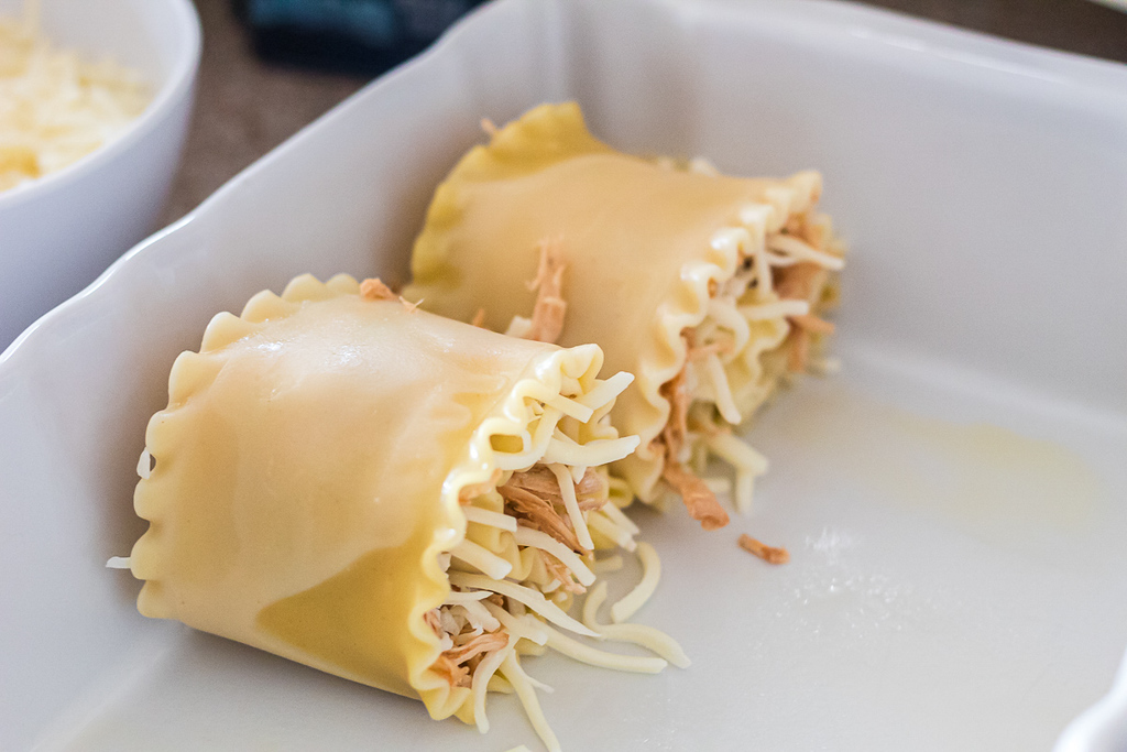 two chicken roll-ups in casserole dish 