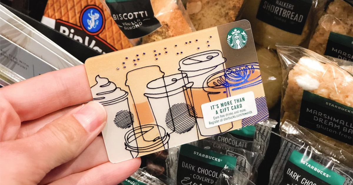 hand holding starbucks gift card