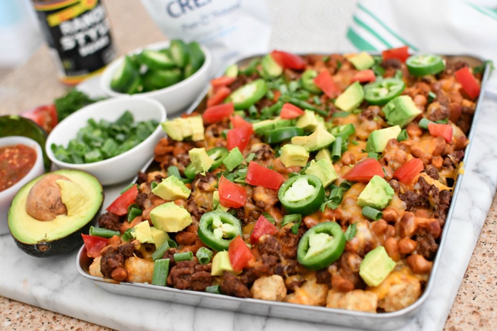 sheet pan of melted tater tot nachos 