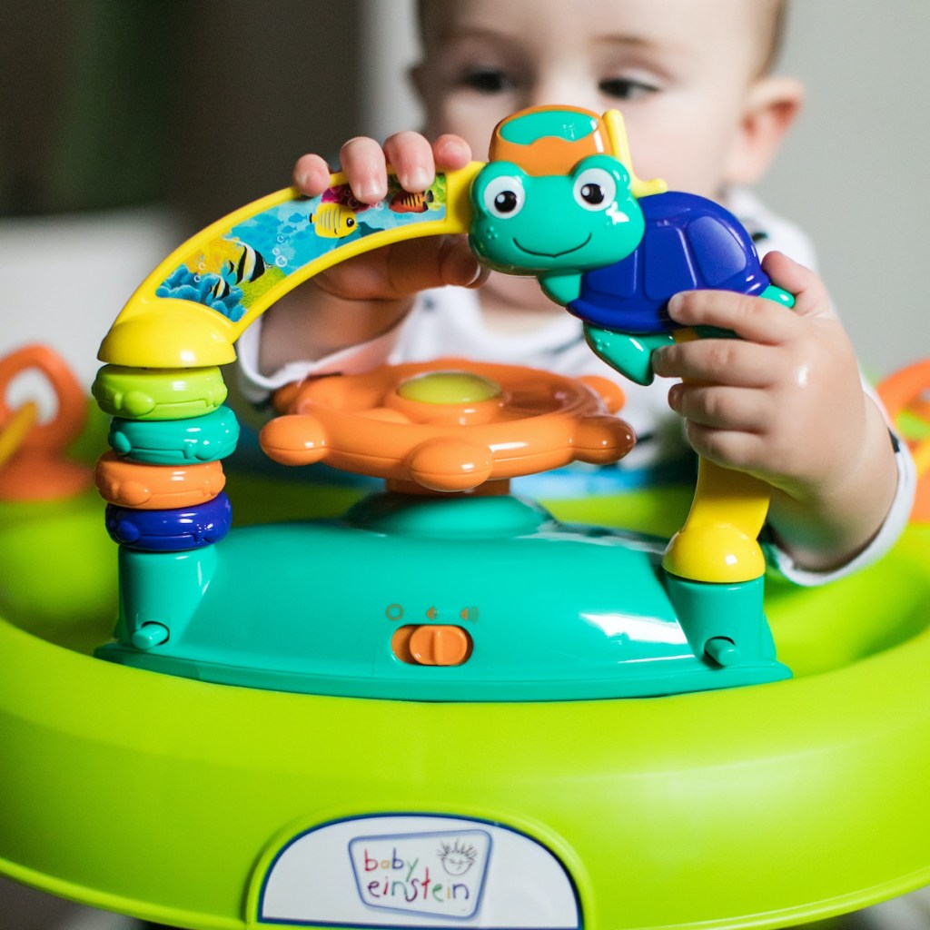 close up of baby in Baby Einstein Sky Explorers Walker