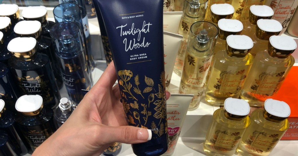 hand holding Bath & Body Works Body Cream