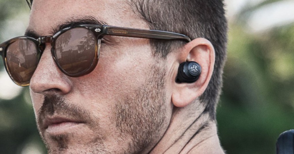 Men wearing Jlab Jbud earbuds