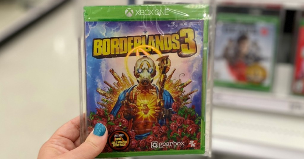 hand holding Borderlands 3 video game