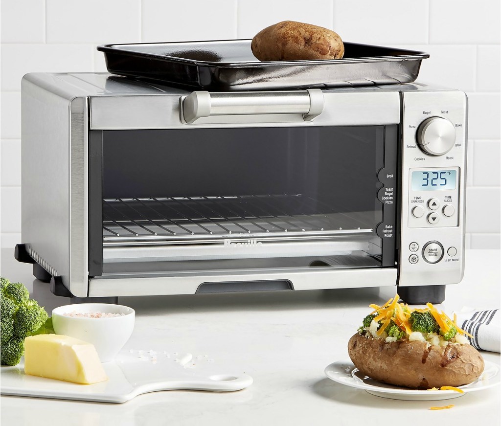 Breville Smart Oven surrounded by baked foods