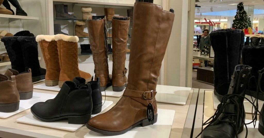  Style & Co Madixe Riding Boots on display in Macy's store