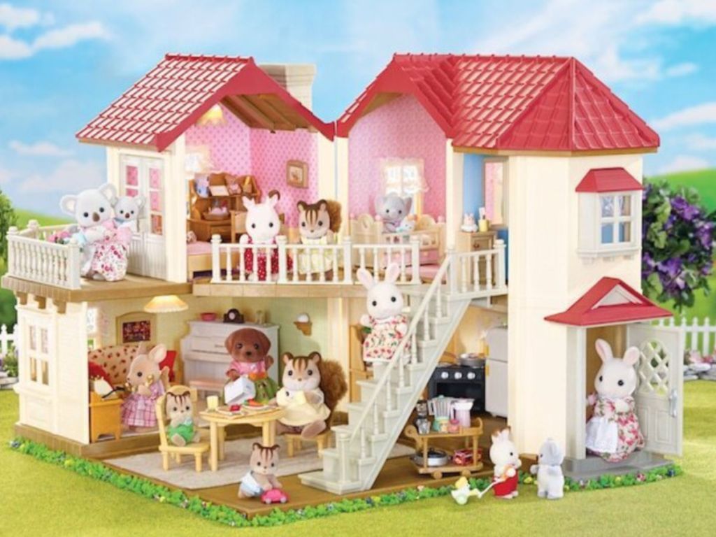 Calico Critters Luxury Townhome Gift Set with sky and grass in the background