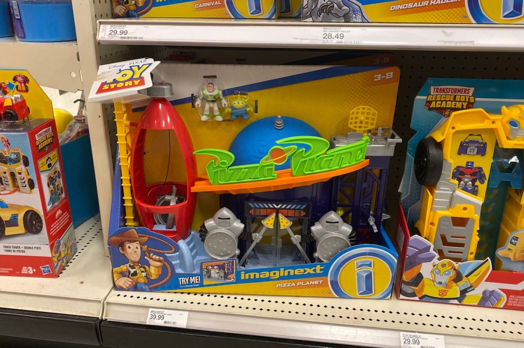 Fisher-Price Imaginext Disney Pixar Toy Story 4 Pizza Planet Playset on shelf at Target