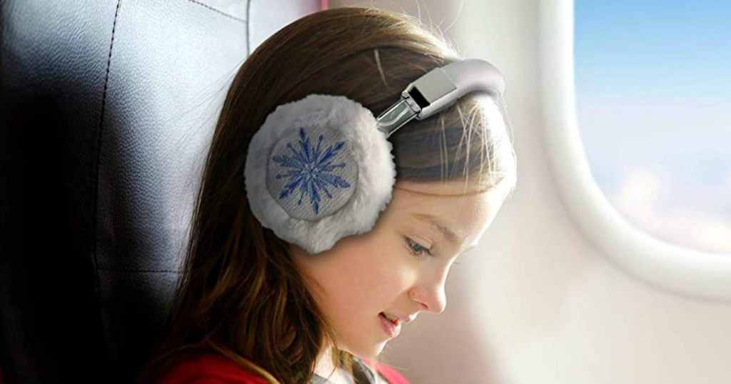 Girl wearing Frozen headphones