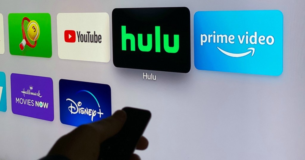 man choosing Hulu on his TV