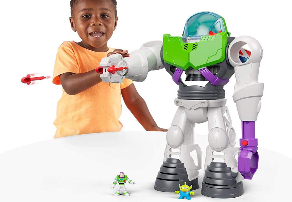 boy playing with Imaginext Buzz Lightyear