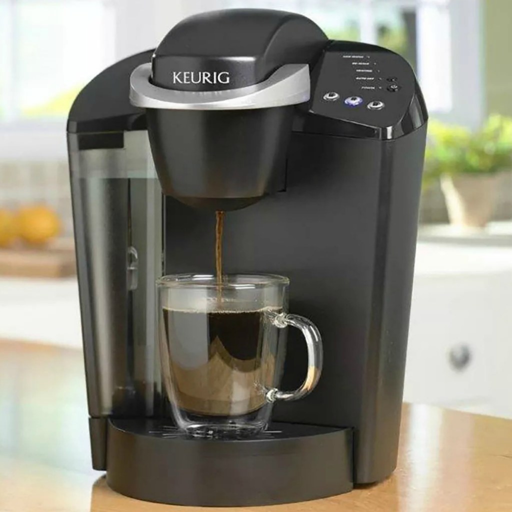 Keurig Coffee maker in black on counter top in kitchen