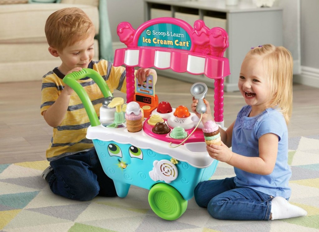 kids playin g on the floor with the LeapFrog scoop & learn ice cream cart