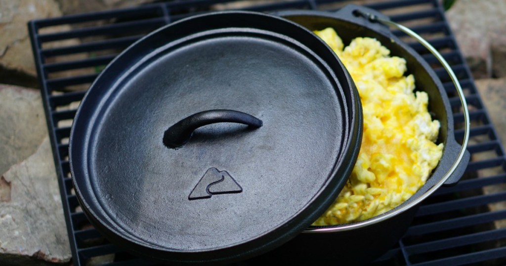 Ozark Trail Dutch Oven on grill with scrambled eggs inside