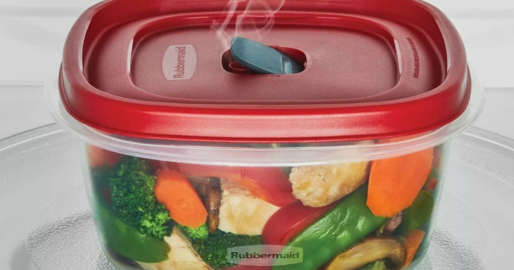 Rubbermaid Plastic food storage container with red lid steaming vegetables in microwave