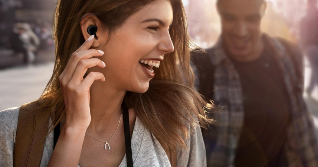 woman using samsung galaxy earbuds