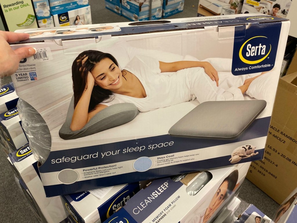 Serta brand pillow in gray, in package near display at Kohl's