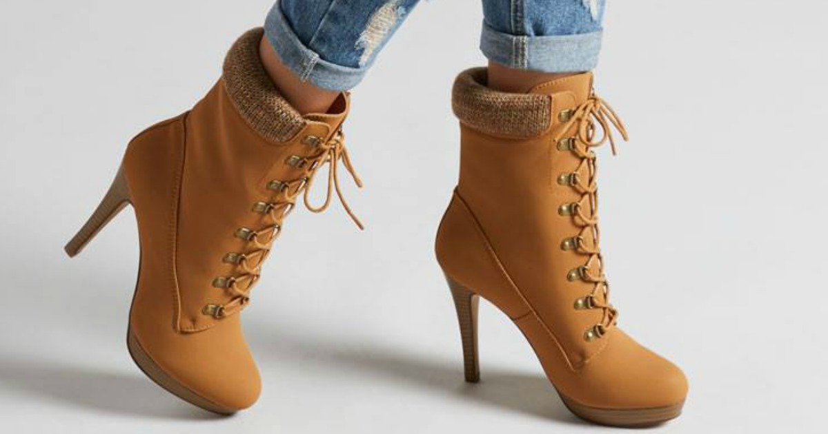 Woman wearing ShoeDazzle Boots 