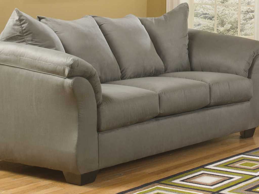 Signature Design by Ashley Audrey Fabric Pad-Arm Sofa in living room