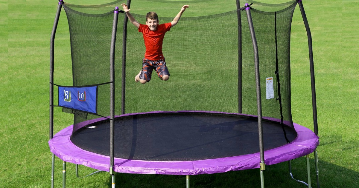 boy jumping on Skywalker Trampoline with net