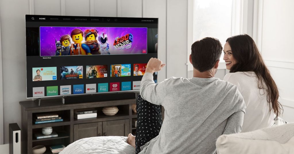 couple watching Vizio TV in living room